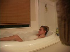 Find-Best-Hardcore.com presents: Hidden camera captures girl masturbating in bathtub